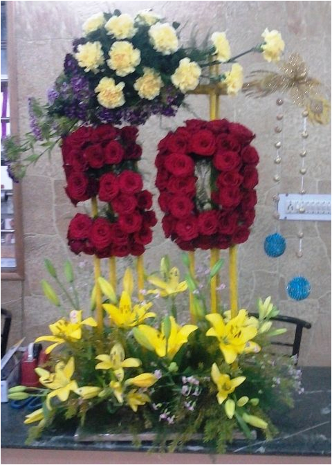 a perfect arrangement of flowers for a grand 50th