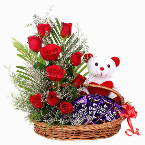 01 beautiful basket arrangement of 10 red roses with teddy