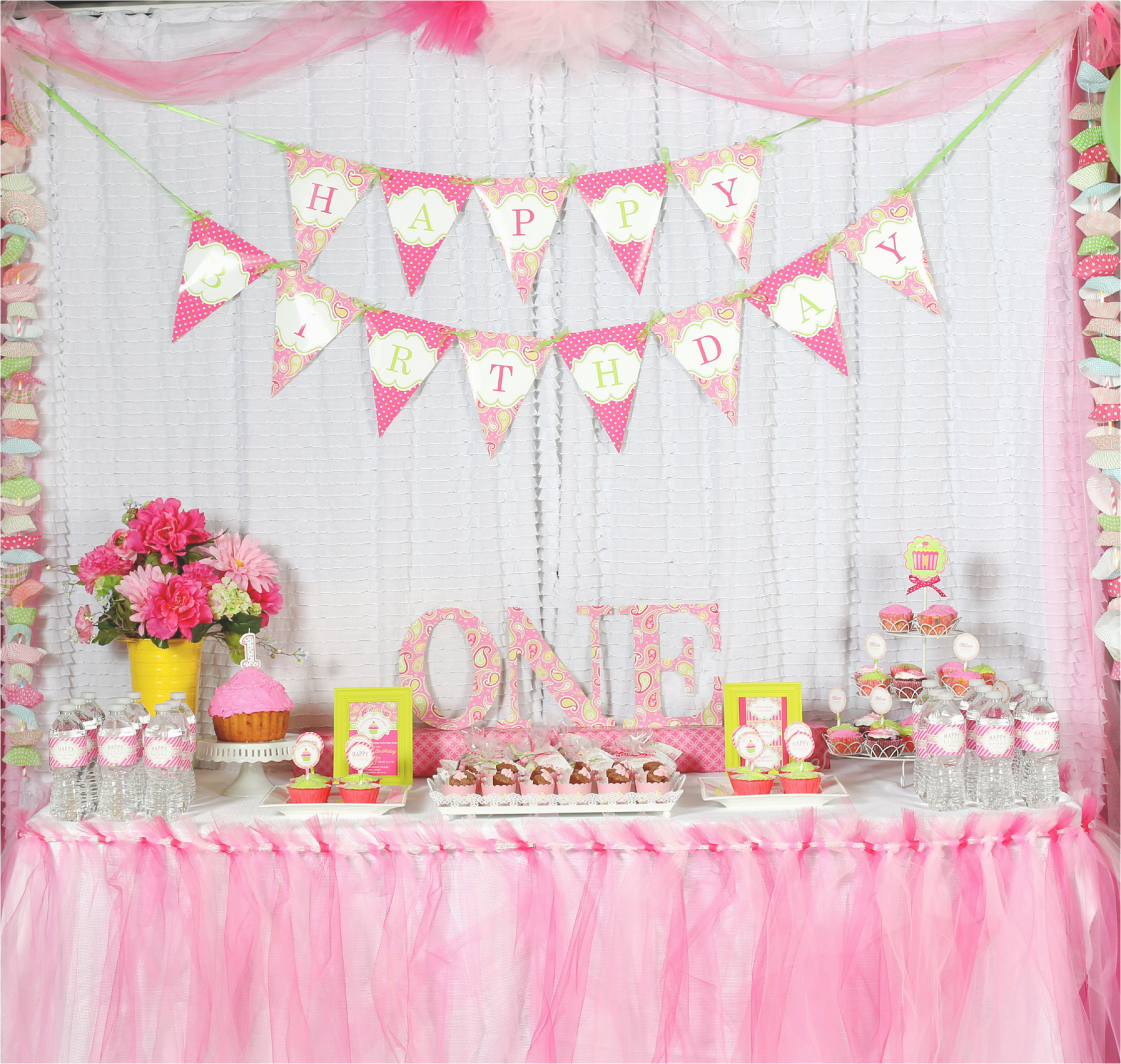 a cupcake themed 1st birthday party with paisley and polka dots