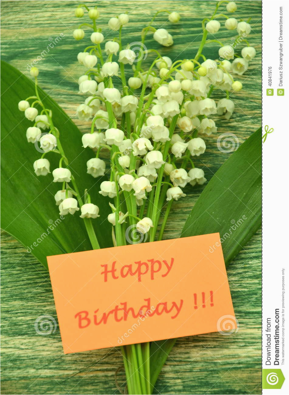 happy birthday and bouquet of delicate fresh lilies of the