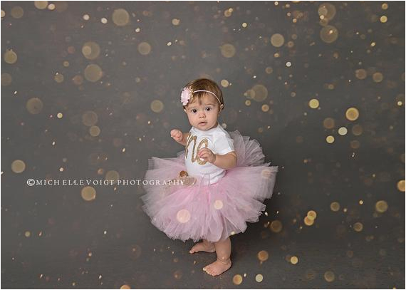 gold first birthday bodysuit and pink