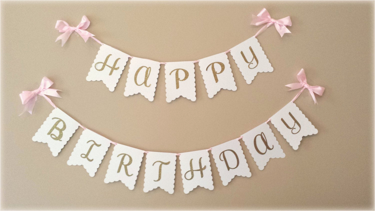 happy birthday banner in gold with white