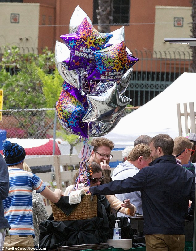 seth rogan receives bouquet balloons 31st birthday doting wife visits onset