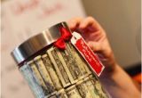 Ideas for 50th Birthday Gifts for Man Fifty One Dollars Bills Rolled Up and Stacked Inside A